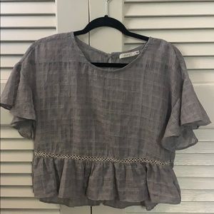 Cropped blouse with ruffle detail
